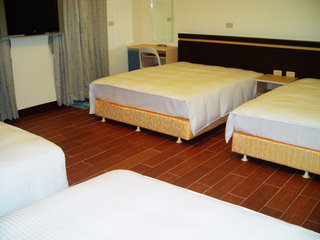 海洋格子的八人房使用四張雙人床，不是一般的地板通鋪