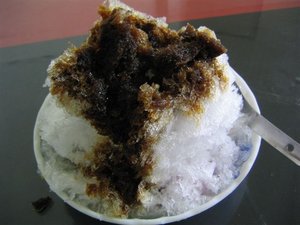 膨鬆的剉冰淋上黑糖熬成的糖水，即使不加入剉冰料，也是夏日解渴鎮暑的聖品